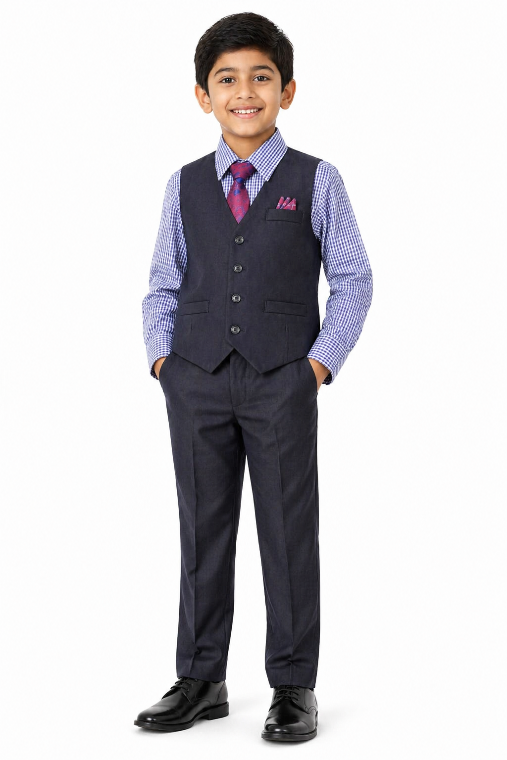 Young boy wearing a formal suit with a vest and tie on a white background
