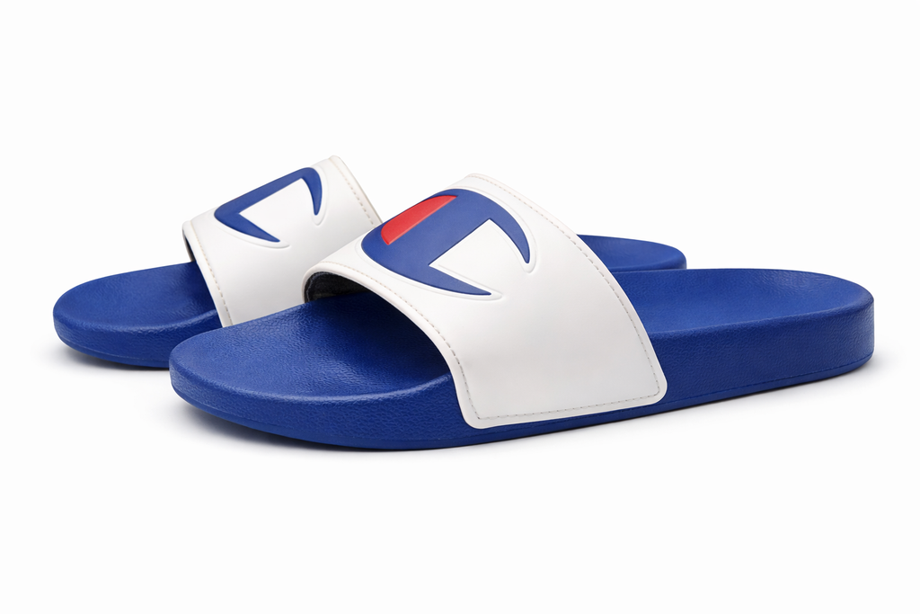 Blue and white slide sandals with a logo on a white background