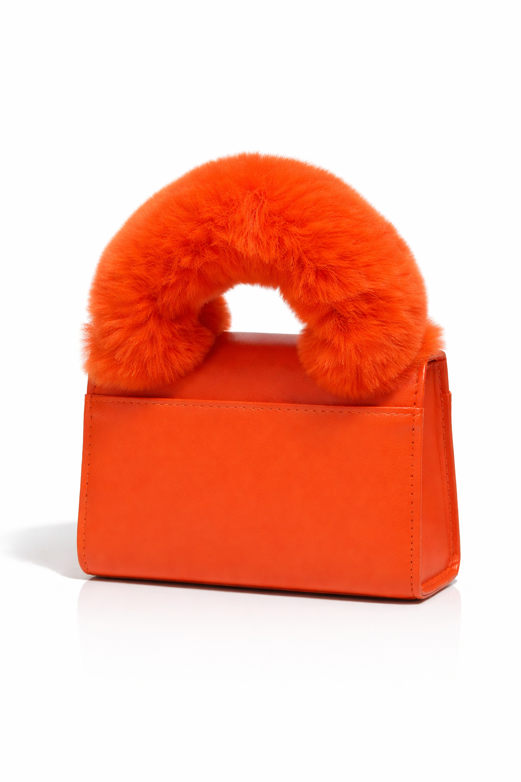 Bright orange mini handbag with a smooth leather body and plush faux fur top handle, displayed on a clean white background with soft shadow for a luxury retail look.