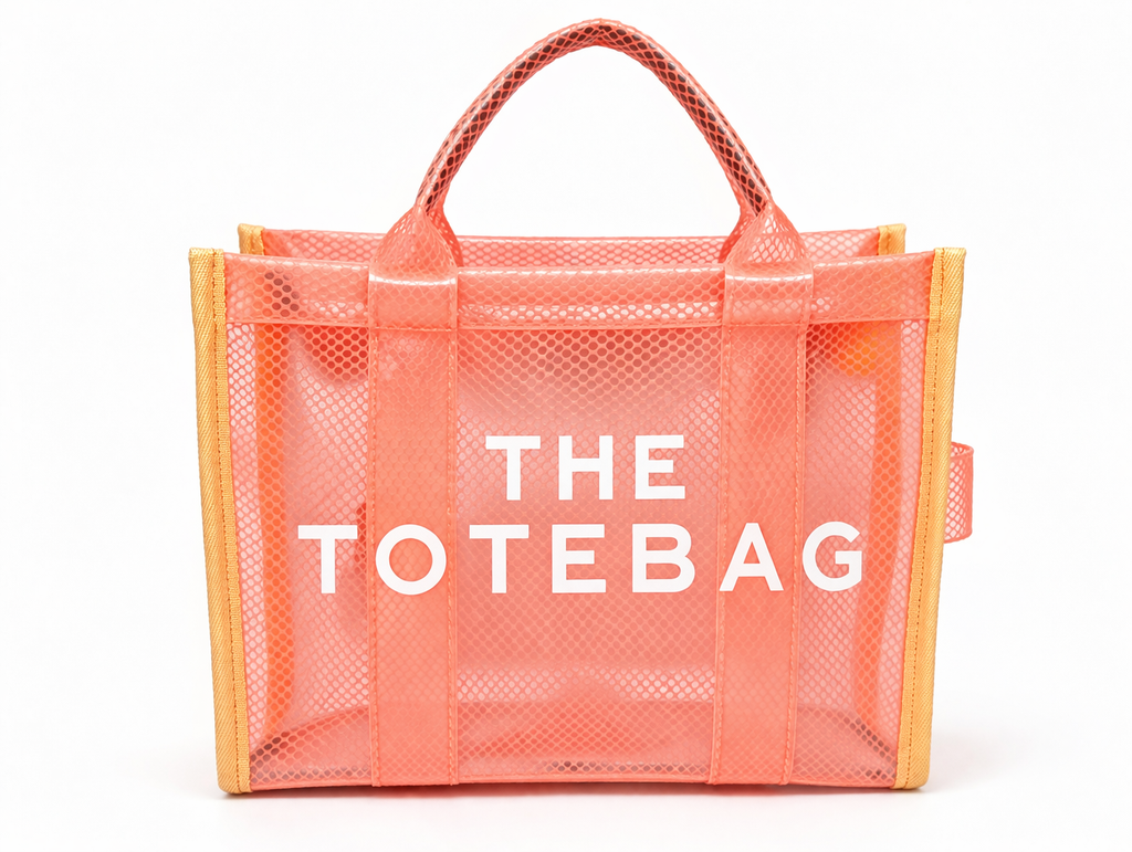 Coral tote bag with 'THE TOTEBAG' text on a white background