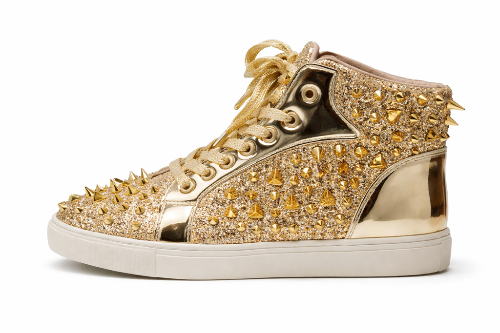 Gold studded high-top sneaker on a white background