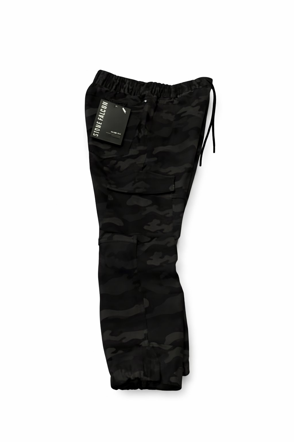 Black camouflage pants with a tag on a white background